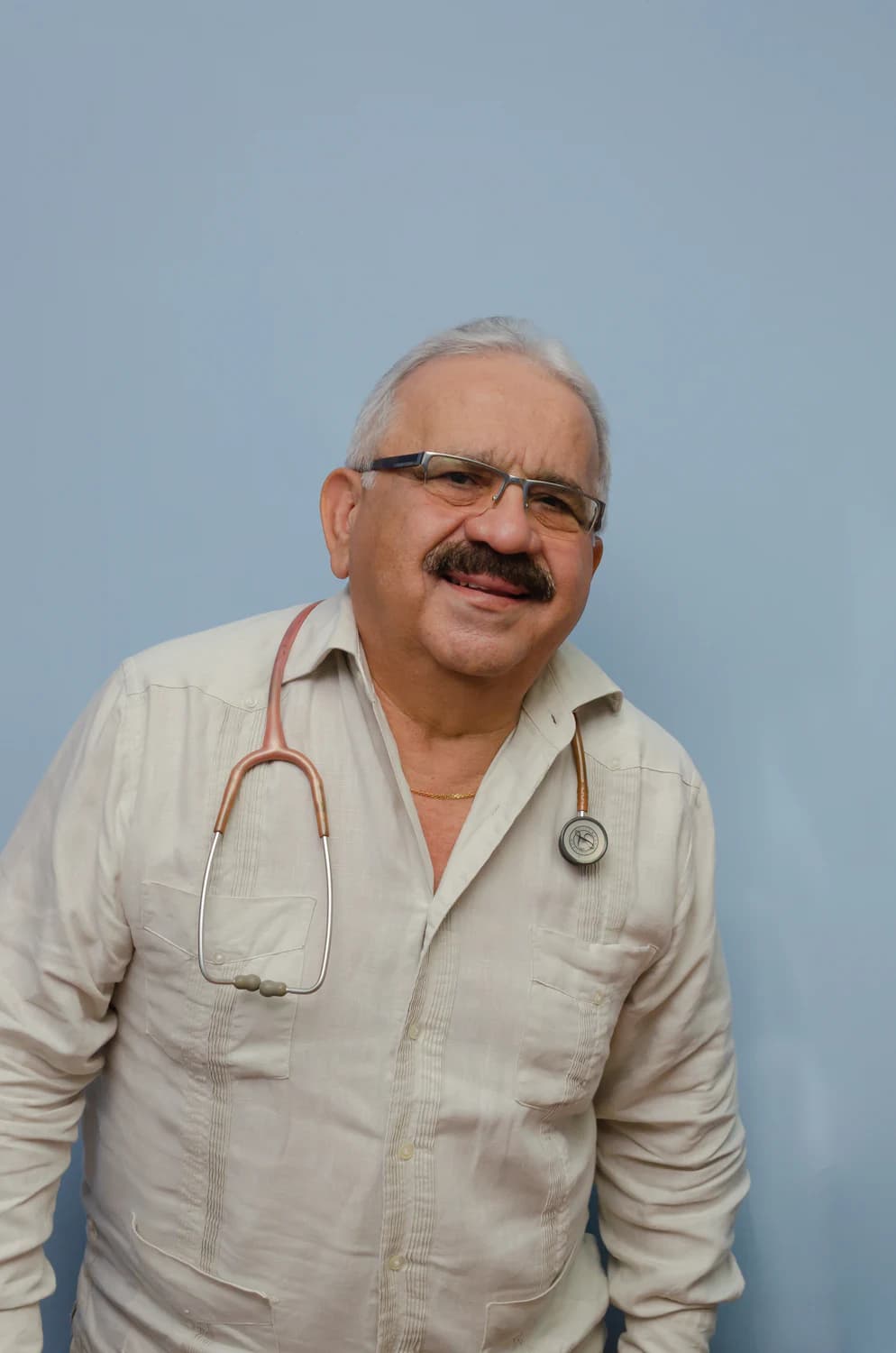 Stand-in portrait: a senior doctor with a stethoscope